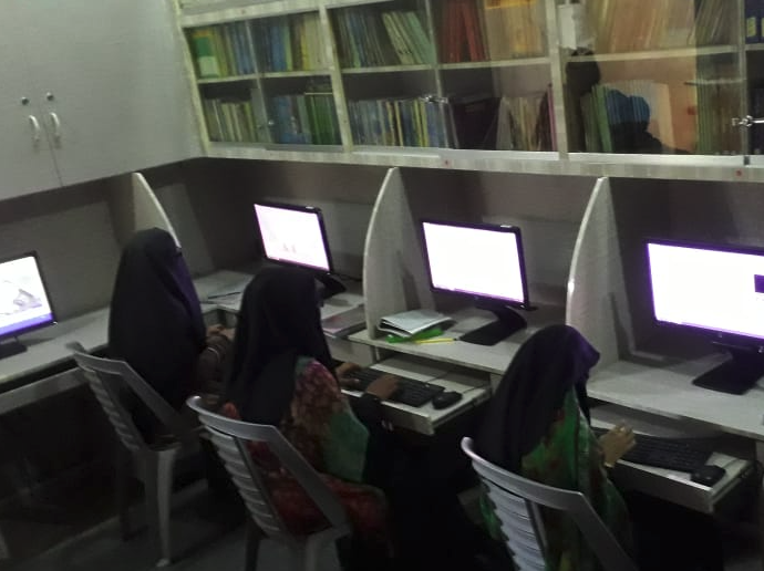 Students learning computer skills