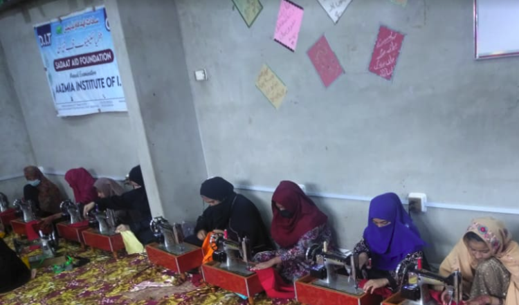 Girls getting tailoring training